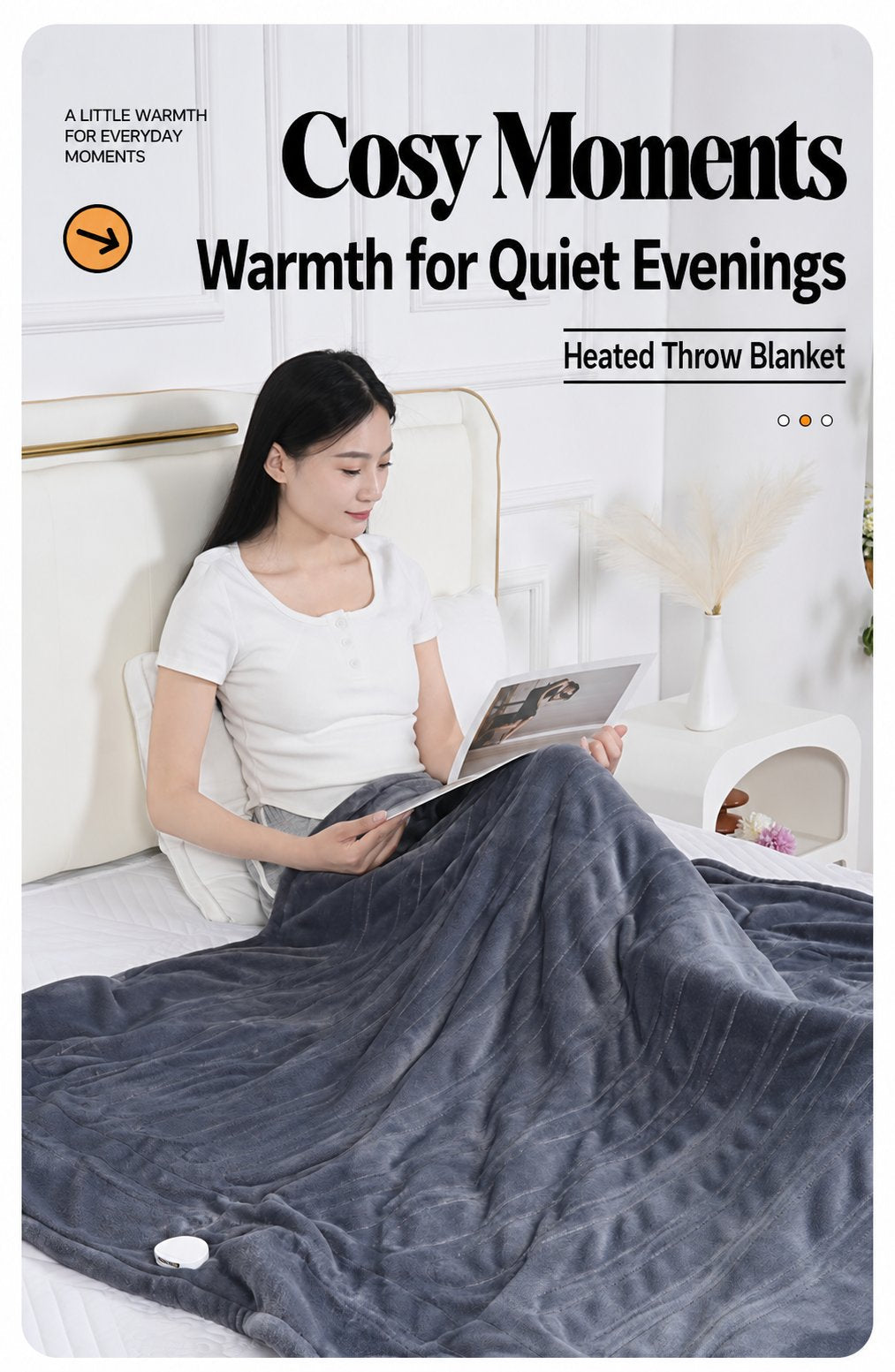 Flannel heated throw draped over the lap while reading at home
