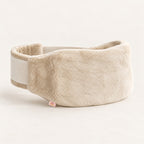 Cream Hot Hugger wearable hot water bottle cover showing the adjustable wraparound strap