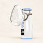 White and light-blue rechargeable mesh nebulizer with clear cup and attached mask