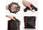 Chain ice grips folded and stored in a drawstring bag - accessory inclusion depends on style
