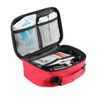 Open first aid carry case showing internal mesh pockets and retaining straps