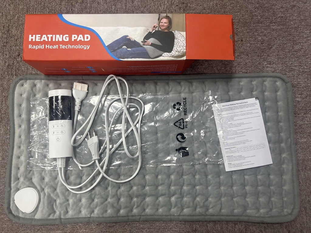 Supplier photograph of model 406 pad, controller, cable and box contents