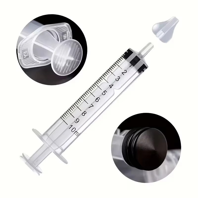 Close-up of the clear manual syringe barrel, soft tip and black plunger seal